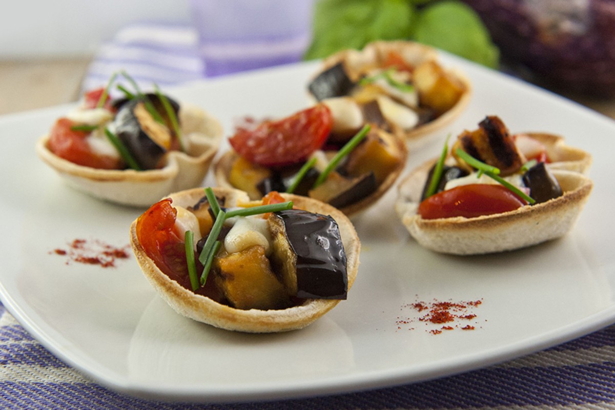 Pane: dalla pizza alle polpette, 10 idee per usarlo come ingrediente in cucina 7 cestini di pane con melanzane e scamorza