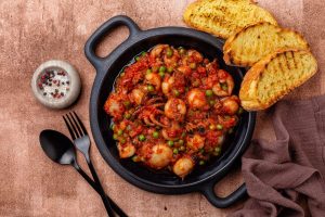 Calamari in umido: la ricetta con il sugo, a prova di scarpetta
