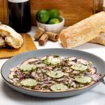 Carpaccio di polpo: ricetta, preparazione e consigli per un piatto gourmet 1 carpaccio di polpo la ricetta di un antipasto di pesce 1024x683 1